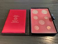 Closed and open presentation case showing coins in plastic holder