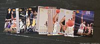 Stack of Upper Deck basketball cards showing fronts with gold foil logos
