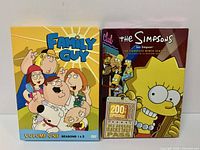 Front view of both DVD box sets