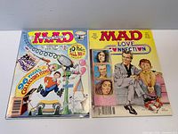 Both magazines front covers side by side