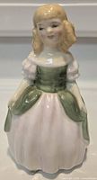 Front view of Royal Doulton Penny figurine