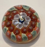 Top view of paperweight showing millefiori pattern and clarity