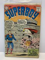 Front cover of Superboy No. 82 showing title, characters and visible damage