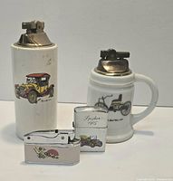 Four vintage lighters including two porcelain table lighters and two chrome pocket lighters