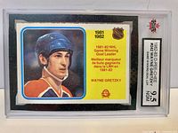 Front view of NGM-encapsulated Wayne Gretzky O-Pee-Chee #242 card showing grade label 9.5