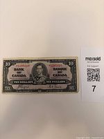 Obverse of 1937 Canadian $10 note showing portrait, serial *1205310