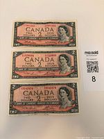 Fronts of the three 1954 Canadian $2 banknotes