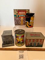 Front view of all five coin banks