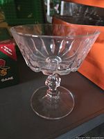 Single clear stemmed dessert bowl showing design and condition