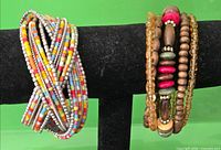 Both bracelets side by side on display stand