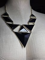 Necklace on bust showing front center detail