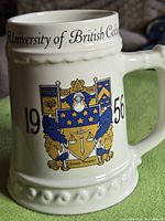 Front view showing UBC crest, 1956 date and rim text