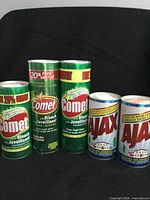Front view of all five cleanser canisters