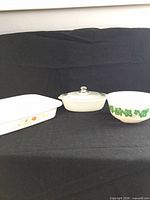 Group shot of rectangular dish, oval casserole with lid, and mixing bowl