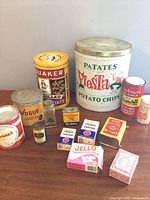 All twelve containers grouped on table