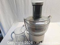 Full view of Breville Juice Fountain Compact juicer with pitcher