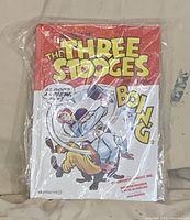 Front view of sealed comic book showing title and artwork