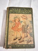 Front cover showing title, author, and pictorial pasted illustration