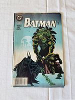 Front cover showing Batman #521 with Killer Croc artwork
