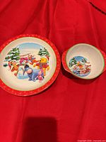 Plate and bowl full view on red background