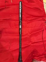 Full length view of JUGS hitting stick