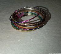 Stack of multicolour bangles standing upright