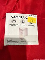 Front of sealed box showing product image and key features