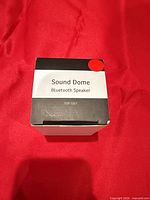 Closed retail box front showing Sound Dome branding and Bluetooth designation