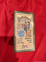 Front of sealed Cavallini Collection whipping top box