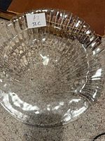 Top view of clear crystal shell-pattern serving dish