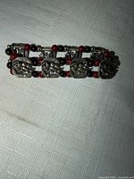 Full view of stretch bracelet showing panels and bead pattern