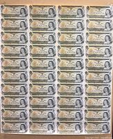Full view of uncut sheet showing forty $1 notes