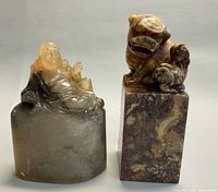 Both carved stone seals front view