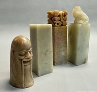 Front view showing all four soapstone pieces