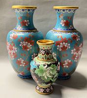 Front view of all three cloisonné vases