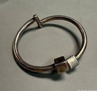 Full view of sterling bangle showing clasp and hinge