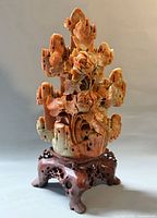 Full view of soapstone sculpture on stand