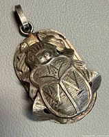 Front view scarab silver pendant