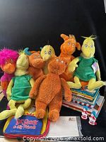 Overall lot with plush toys, books, case, figures and first day cover