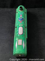 Top view showing full lithographed tin body and chimney stack