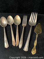 All six flatware pieces side by side