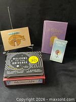 Group shot of all items: Universe book, Medicine Cards deck & book, Morrigan deck box, Protection Bear plaque