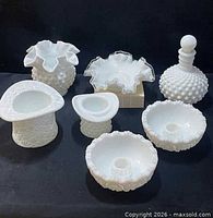 Group shot showing all eight milk glass pieces