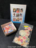 Souvenir sheet, tray of loose stamps, bag of loose stamps