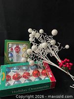 Two boxed ornament sets and berry stems full lot view