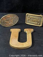 Group shot of all three brass items