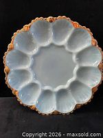 Top view showing twelve-well deviled egg platter and gold rim