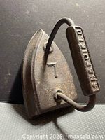 Top view showing stamped 7 and loop handle attachment