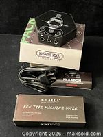 Power supply, Emalla covers box, power cord on original packaging