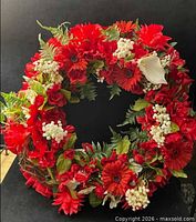 Full view of floral wreath showing size and overall arrangement